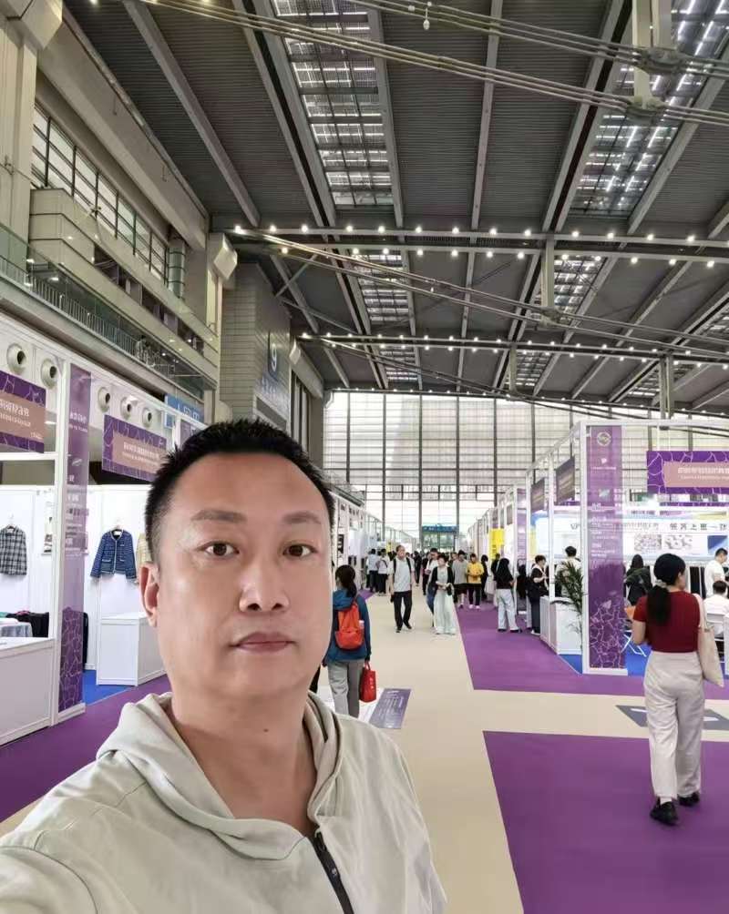 China sourcing agent exploring fabric trends at the textile and apparel expo