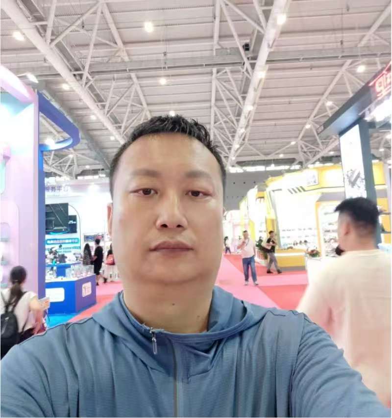 China toy sourcing agent Yan exploring supplier booths at the Shenzhen Toy Fair
