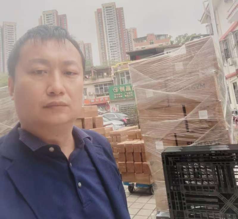 Consolidating wholesale goods on pallets at our China sourcing warehouse