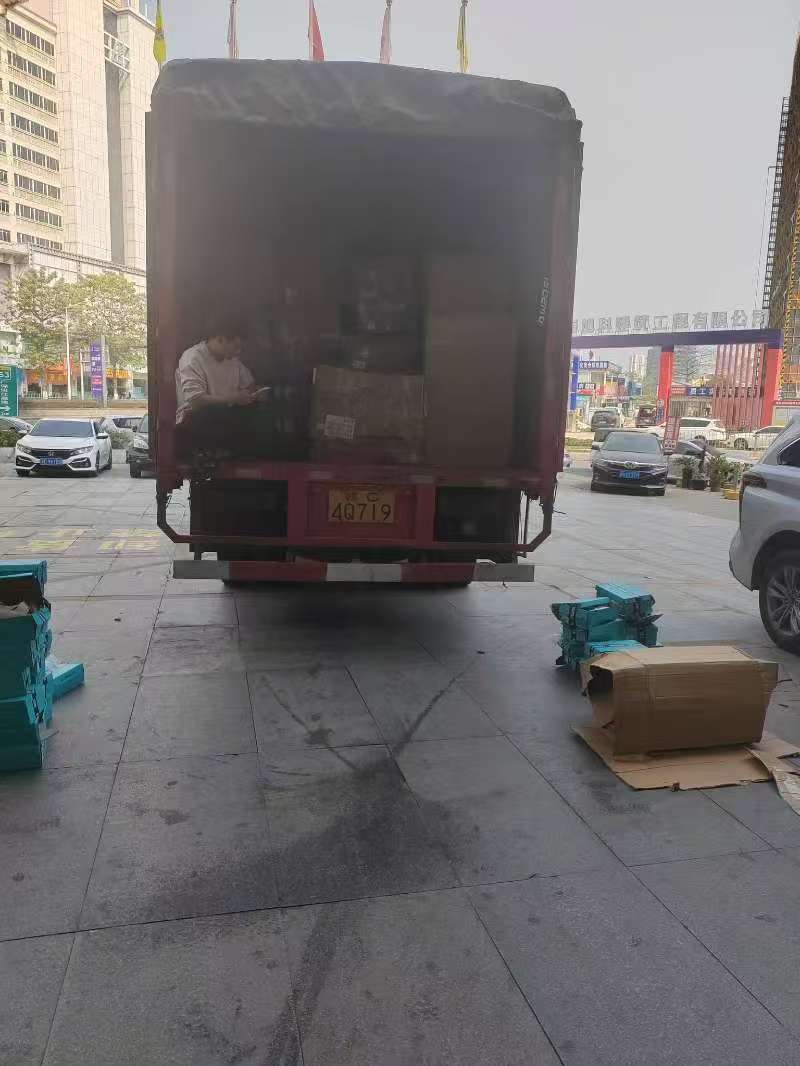 Loading truck with repacked goods for international shipping