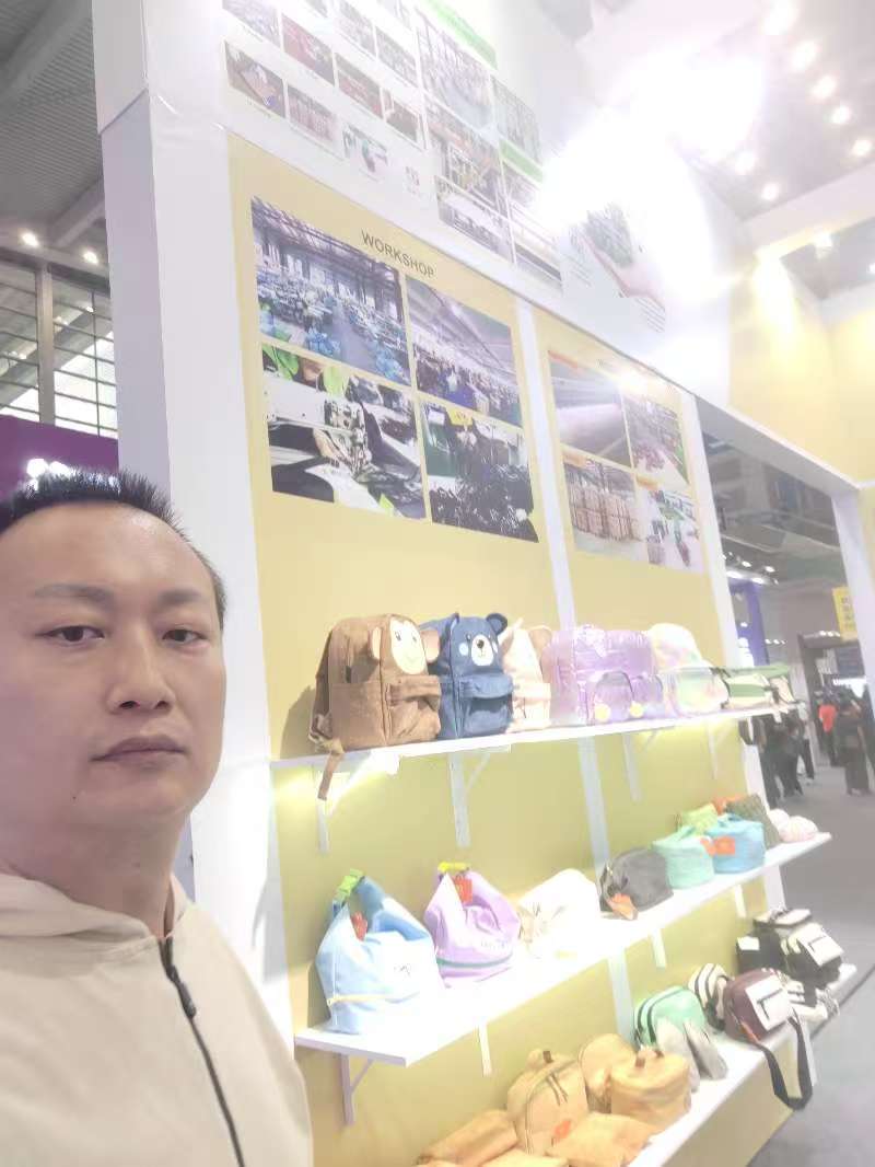 Checking product categories and manufacturing details at the CHWE Shenzhen Expo